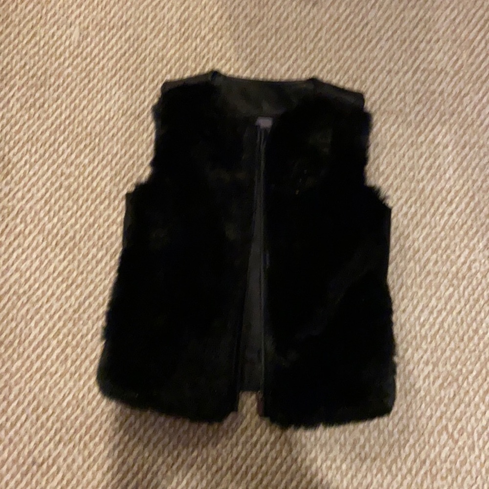 Leather and fur vest